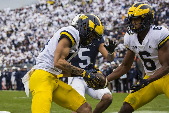 Mike Sainristil (5) and Cornelius Johnson (6)