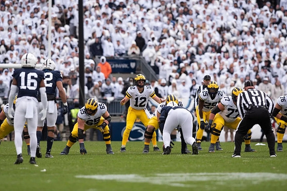 Zak Zinter (65), Cade McNamara (12), Andrew Vastardis (68), Hassan Haskins (25), Trevor Keegan (77), and Ryan Hayes (76)