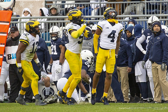 Josh Ross (12), David Ojabo (55), and Vincent Gray (4)