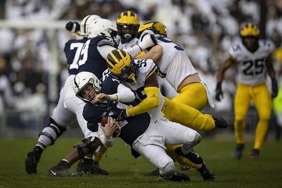 David Ojabo (55), Mike Morris (90), and Junior Colson (25)