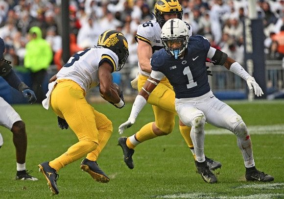 Cornelius Johnson (6) and Luke Schoonmaker (86)