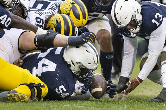 Andrew Vastardis (68) and Hassan Haskins (25)