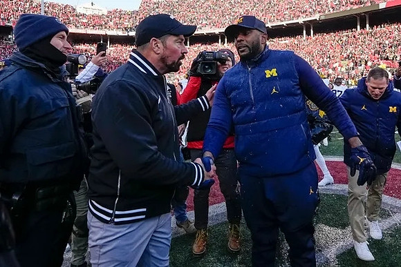 Ohio State Head Coach Ryan Day and Sherrone Moore
