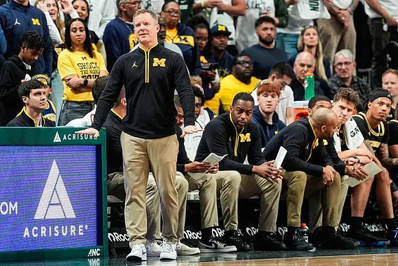 Dusty May and Michigan Team