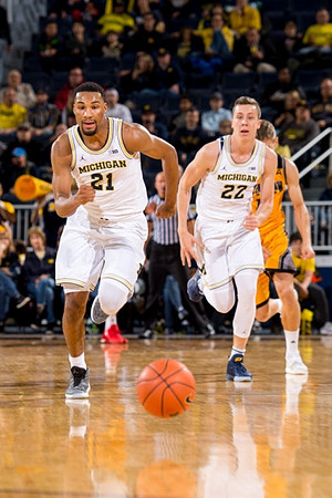 Zak Irvin (21) and Duncan Robinson (22)
