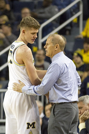 Moritz Wagner (13) and John Beilein
