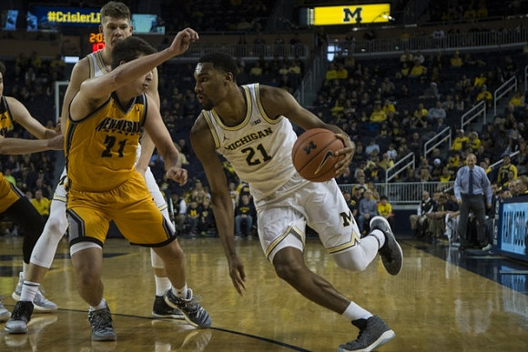 Moritz Wagner (13) and Zak Irvin (21)