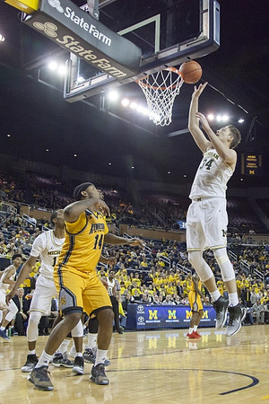Muhammad-Ali Abdur-Rahkman (12) and Mark Donnal (34)