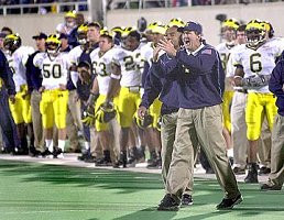 Lloyd Carr, Joseph Sgroi, P.J. Cwayna (63), Chris Perry (23), and  Victor Hobson (6)