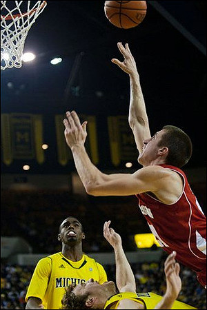 Tim Hardaway Jr. (10) and Zack Novak (0)