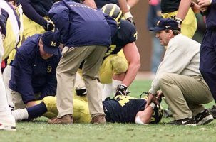 Justin Fargas (34), Jon Jansen (77), and Lloyd Carr