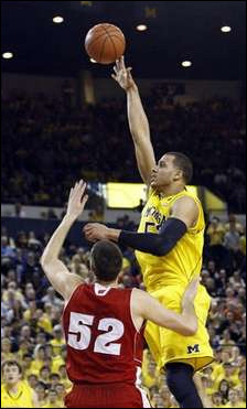 Jordan Morgan (52) and Zack Novak (0)