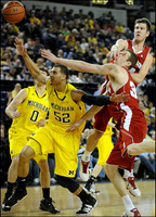 Zack Novak (0) and Jordan Morgan (52)