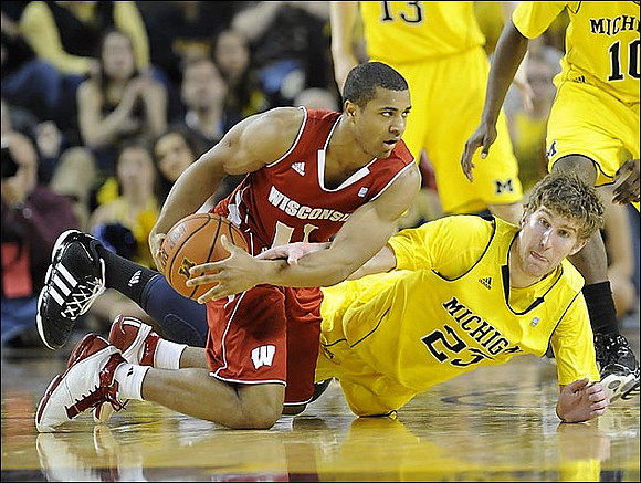 Matt Vogrich (13), Tim Hardaway Jr. (10), and Evan Smotrycz (23)