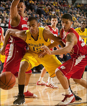 Jon Horford (15) and Tim Hardaway Jr. (10)