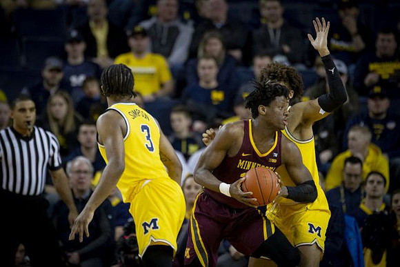 Zavier Simpson (3) and Jordan Poole (2)