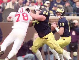Steve Frazier (64) and Tom Brady (10)