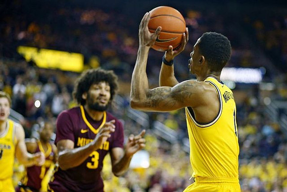 Charles Matthews (1) and Ignas Brazdeikis (13)