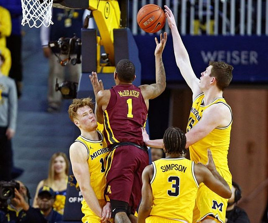 Ignas Brazdeikis (13), Zavier Simpson (3), and Jon Teske (15)