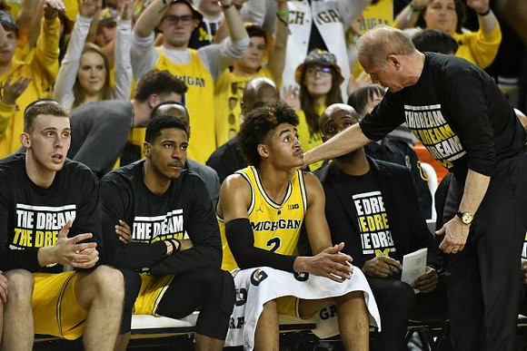 Austin Davis (51), Charles Matthews (1), Jordan Poole (2), Deandre Haynes, and John Beilein