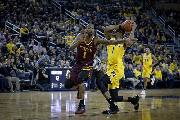 Charles Matthews (1) and Eli Brooks (55)