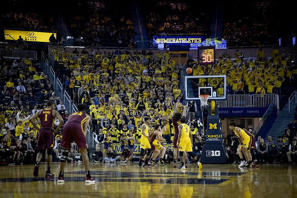 Charles Matthews (1), Jon Teske (15), Zavier Simpson (3), and Jordan Poole (2)