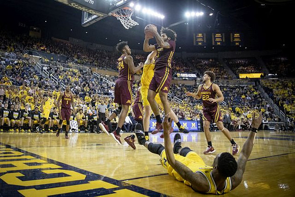 Zavier Simpson (3), Jon Teske (15), and Charles Matthews (1)