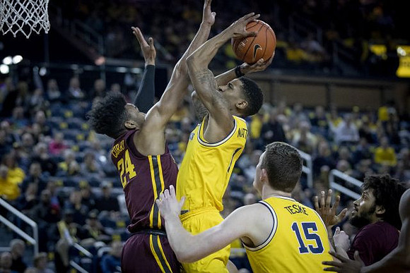 Charles Matthews (1) and Jon Teske (15)