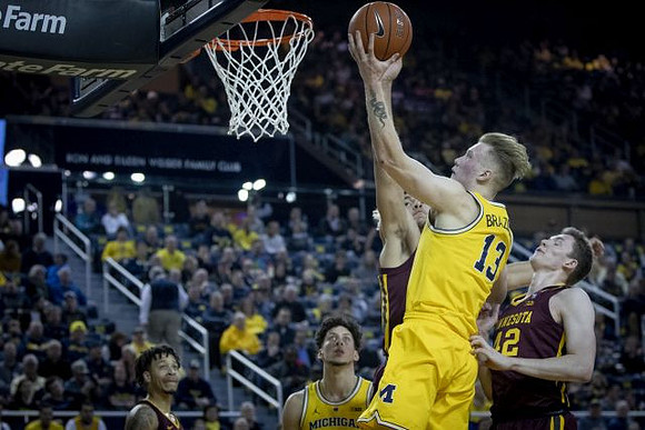 Ignas Brazdeikis (13) and Brandon Johns Jr. (23)