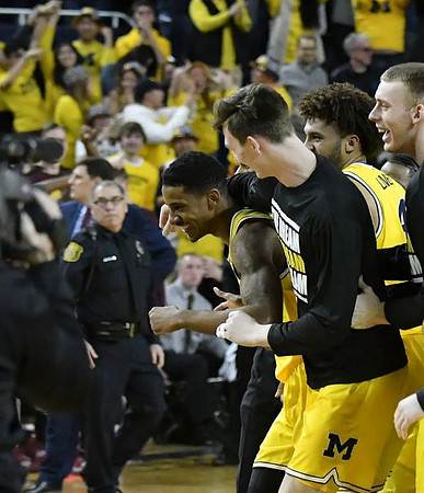 Charles Matthews (1), Colin Castleton (11), Isaiah Livers (4), and Austin Davis (51)