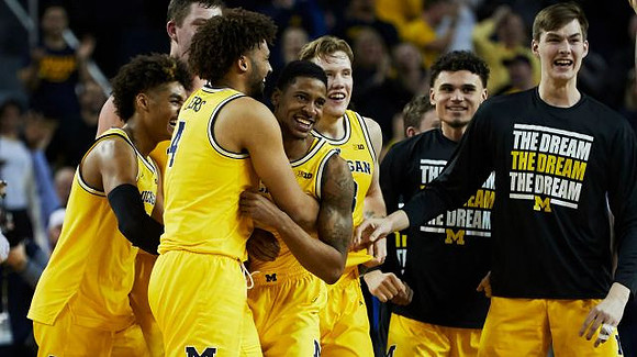 Jordan Poole (2), Jon Teske (15), Isaiah Livers (4), Charles Matthews (1), Ignas Brazdeikis (13), Adrien Nunez (5), and Colin Castleton (11)