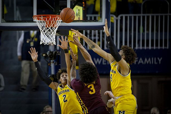 Jordan Poole (2) and Isaiah Livers (4)