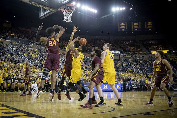 Charles Matthews (1) and Jon Teske (15)