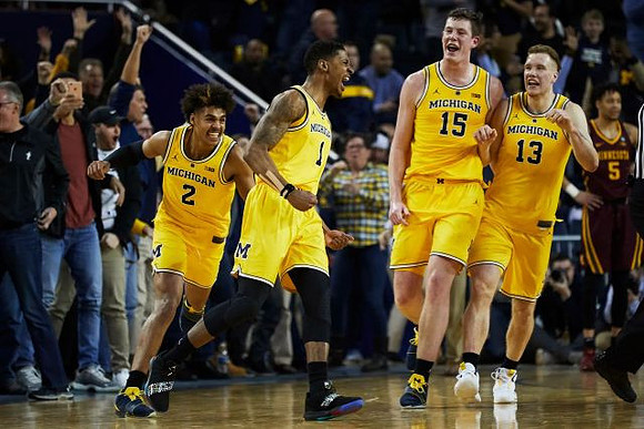 Jordan Poole (2), Charles Matthews (1), Jon Teske (15), and Ignas Brazdeikis (13)