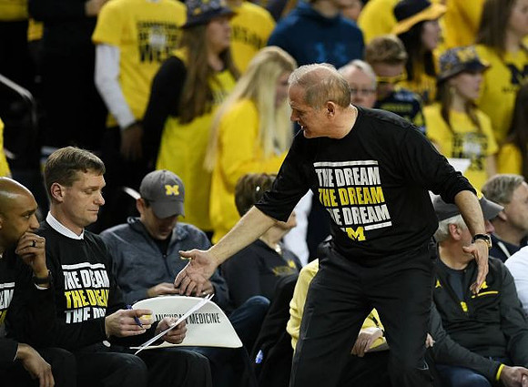 Saddi Washington, Luke Yaklich, and John Beilein