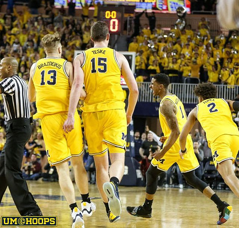Ignas Brazdeikis (13), Jon Teske (15), Charles Matthews (1), and Jordan Poole (2)