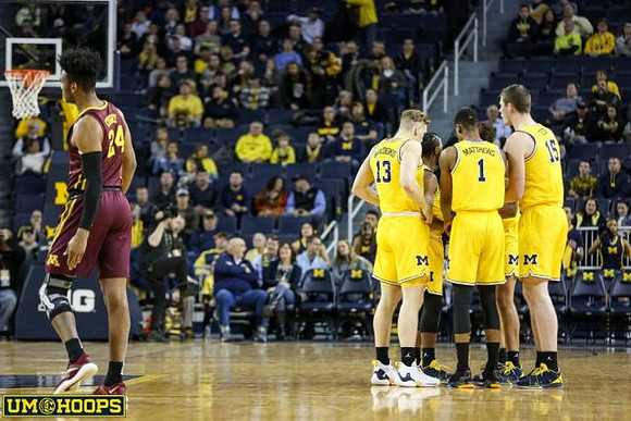 Ignas Brazdeikis (13), Zavier Simpson (3), Charles Matthews (1), and Jon Teske (15)