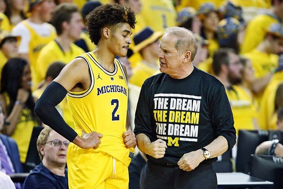 Jordan Poole (2) and John Beilein