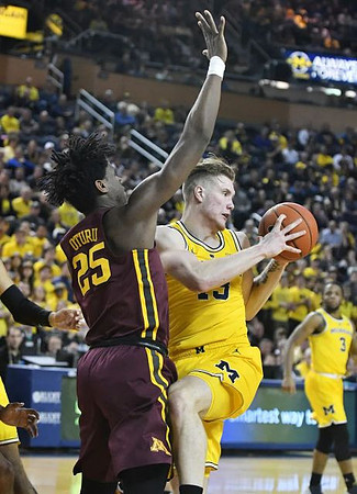 Ignas Brazdeikis (13) and Zavier Simpson (3)