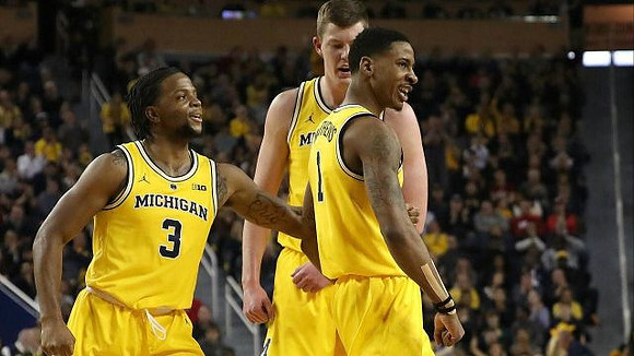 Zavier Simpson (3), Jon Teske (15), and Charles Matthews (1)