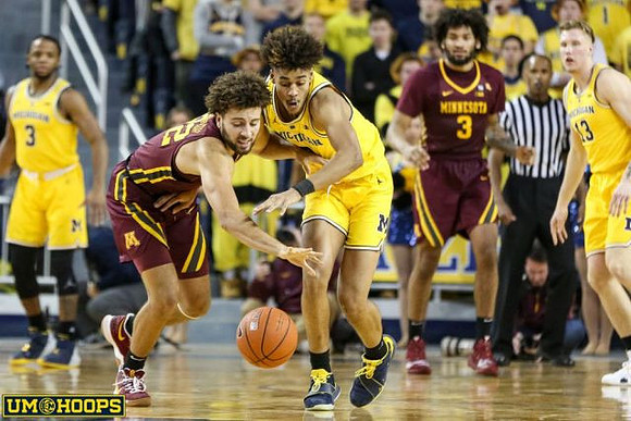 Zavier Simpson (3), Jordan Poole (2), and Ignas Brazdeikis (13)