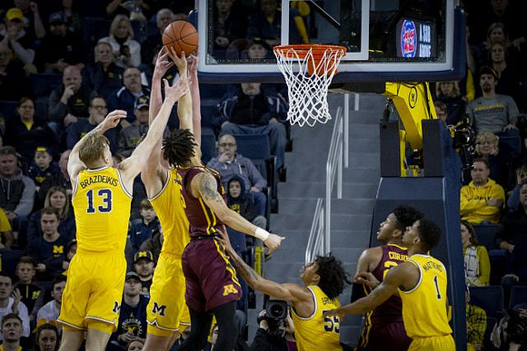 Ignas Brazdeikis (13), Jon Teske (15), Eli Brooks (55), and Charles Matthews (1)