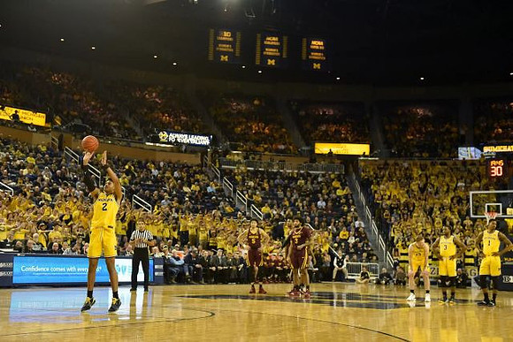 Jordan Poole (2), Ignas Brazdeikis (13), Zavier Simpson (3), and Charles Matthews (1)