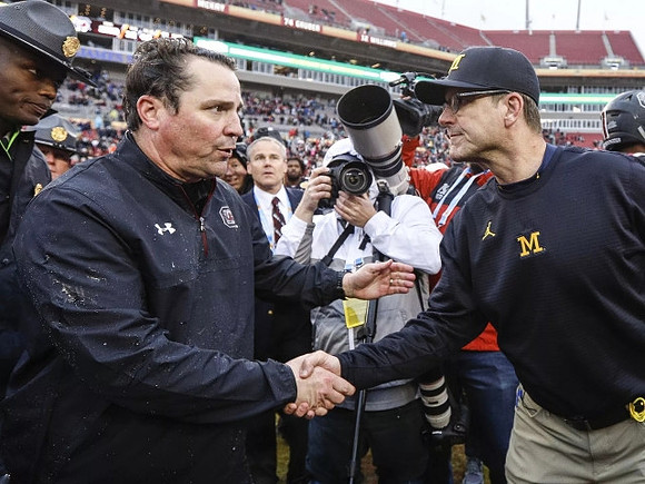 South Carolina Head Coach Will Muschamp and Jim Harbaugh