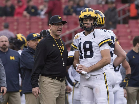 Jim Harbaugh and Brandon Peters (18)