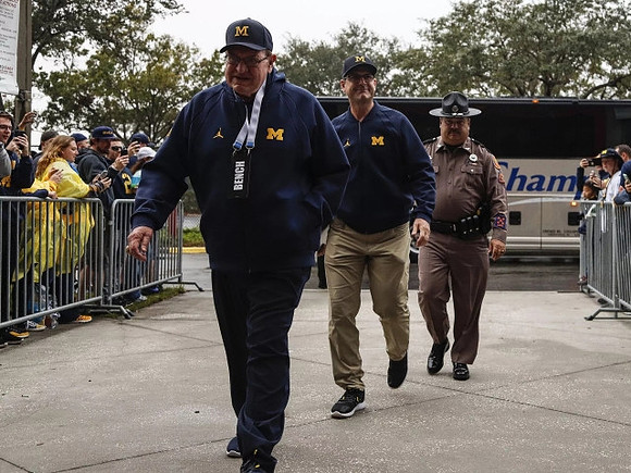Jon Falk and Jim Harbaugh