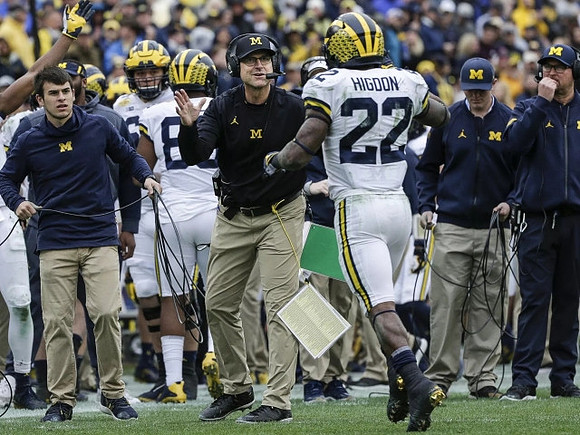 Jim Harbaugh and Karan Higdon (22)