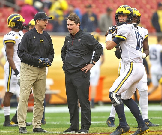 Jim Harbaugh, South Carolina Head Coach Will Muschamp, and Dylan McCaffrey (10)