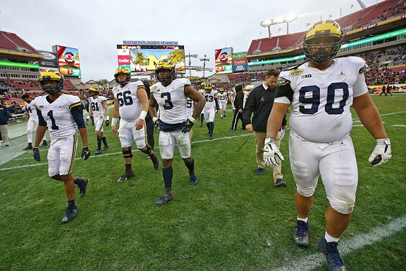 Ambry Thomas (1), Nate Schoenle (81), Chuck Filiaga (66), Rashan Gary (3), and Bryan Mone (90)