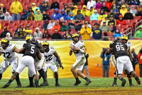 Stephen Spanellis (72), Karan Higdon (22), Brandon Peters (18), and Mason Cole (52)